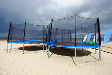 Image showing Trampolines in beach