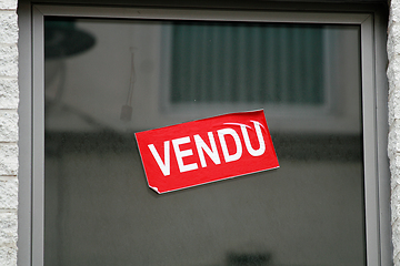 Image showing Sold sticker in window