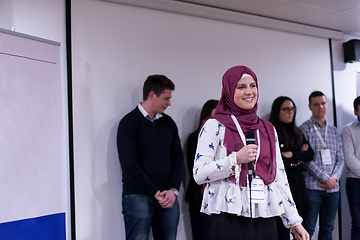 Image showing Muslim businesswoman giving presentations