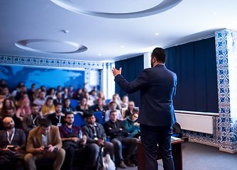 Image showing successful businessman giving presentations at conference room