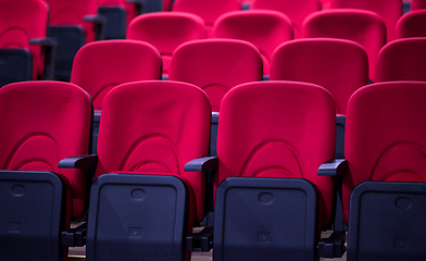 Image showing hall with rows of red seats