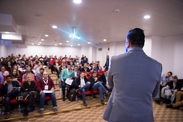 Image showing successful businessman giving presentations at conference room