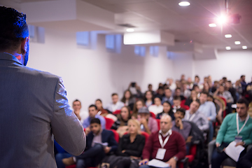 Image showing successful businessman giving presentations at conference room