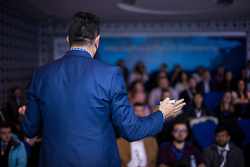 Image showing successful businessman giving presentations at conference room