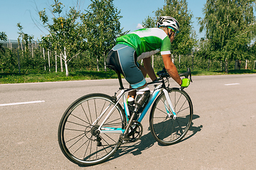 Image showing Athlete disabled amputee training in cycling