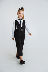 Image showing Girl preparing for school after a long summer break. Back to school.