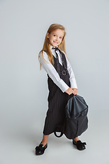 Image showing Girl preparing for school after a long summer break. Back to school.