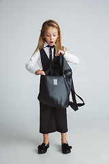 Image showing Girl preparing for school after a long summer break. Back to school.