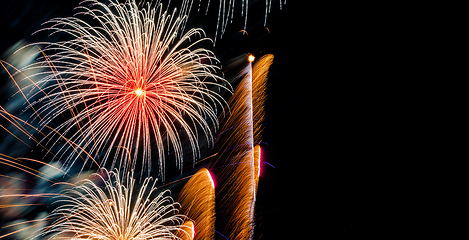 Image showing Brightly Colorful Fireworks on dark sky background