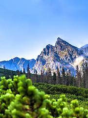 Image showing Polish Tatra mountains summer landscape with blue sky and white clouds.