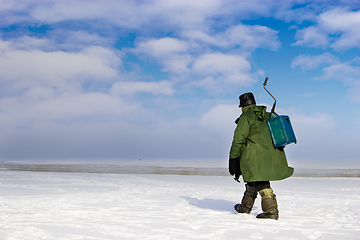 Image showing Ice Fisherman going away