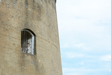 Image showing Window with metal bars in the thick wall of Wish Tower in Eastbo