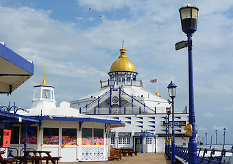 Image showing Open deck of Eastbourne pier with seating and arcade entertainme