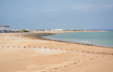 Image showing Eastbourne shingle beach in East Sussex, almost deserted on a su