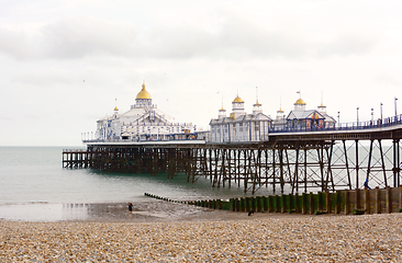 Image showing Pleasure pier with gold-topped towers, built out into the sea in