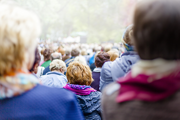 Image showing Large crowd of people in city park