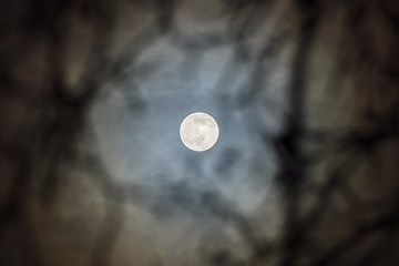 Image showing Full moon against cloudy night sky