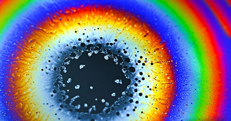 Image showing Smooth colorful liquid flowing as background texture