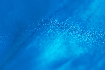 Image showing Smooth colorful liquid flowing as background texture