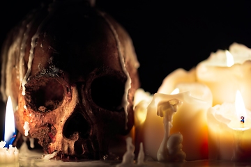 Image showing Human skull in candle light closeup