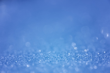 Image showing Smooth colorful liquid flowing as background texture