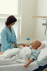 Image showing woman patient with cancer in hospital with friend