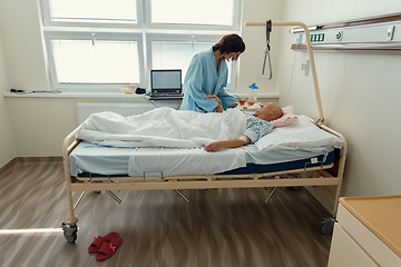 Image showing woman patient with cancer in hospital with friend