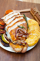 Image showing roasted grilled BBQ chicken breast with herbs and spices 