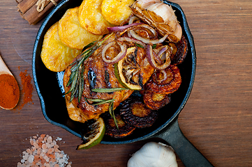 Image showing roasted grilled BBQ chicken breast with herbs and spices 