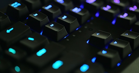 Image showing illuminated mechanical keyboard closeup photo