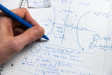 Image showing Math exersize in white notebook closeup