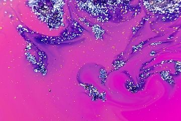 Image showing Smooth colorful liquid flowing as background texture