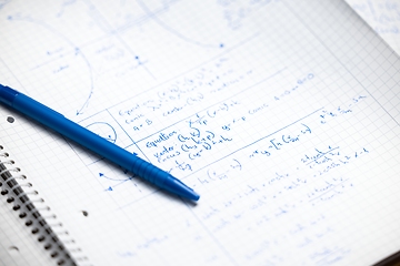 Image showing Math exersize in white notebook closeup