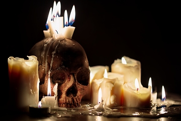 Image showing Human skull in candle light closeup