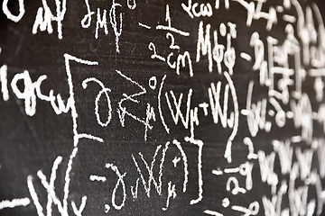 Image showing Mathematical formulas on dark black chalk board