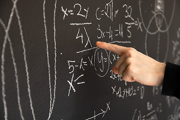 Image showing Mathematical formulas on dark black chalk board