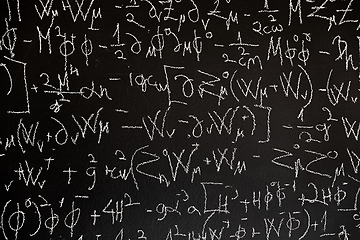 Image showing Mathematical formulas on dark black chalk board