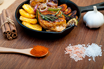 Image showing roasted grilled BBQ chicken breast with herbs and spices 