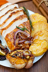 Image showing roasted grilled BBQ chicken breast with herbs and spices 