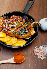 Image showing roasted grilled BBQ chicken breast with herbs and spices 