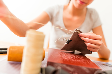 Image showing Handmade leather craft at home