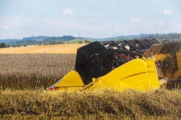 Image showing Summer harvesting with automatic harvester