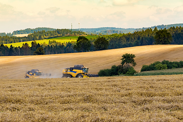 Image showing Summer harvesting with automatic harvester