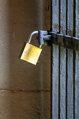 Image showing Padlock on iron gate