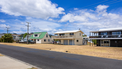 Image showing road with houses in New Zealand