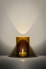 Image showing orange candle with space for your content