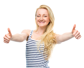 Image showing Young woman is showing thumb up gesture