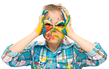 Image showing Portrait of a cute girl playing with paints