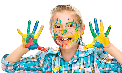 Image showing Portrait of a cute girl playing with paints