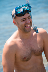 Image showing fisherman preparing for underwater fishing